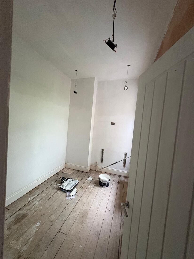 First fix wiring in a lounge with wall panelling