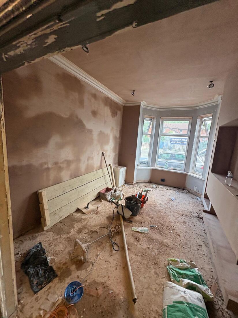 Full house rewire in progress with walls chased